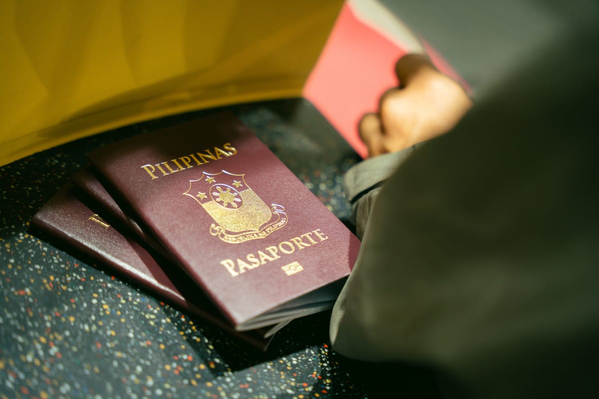 A stack of passports on a table