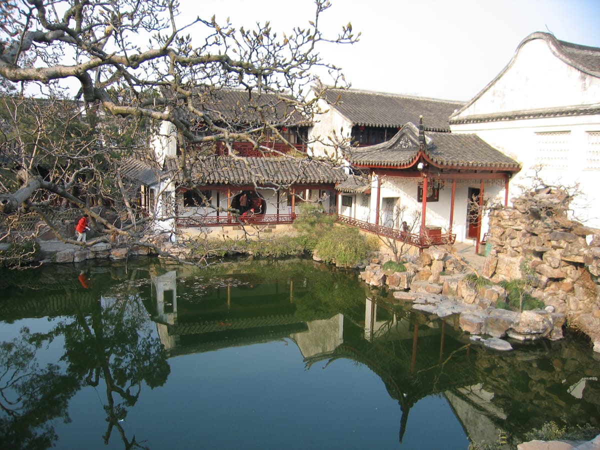 Pond and reflected halls at the Master of Nets Garden, Suzhou