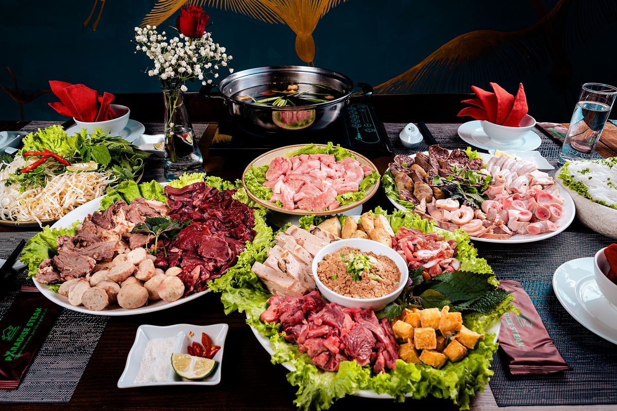A spread of raw hotpot ingredients ready to cook