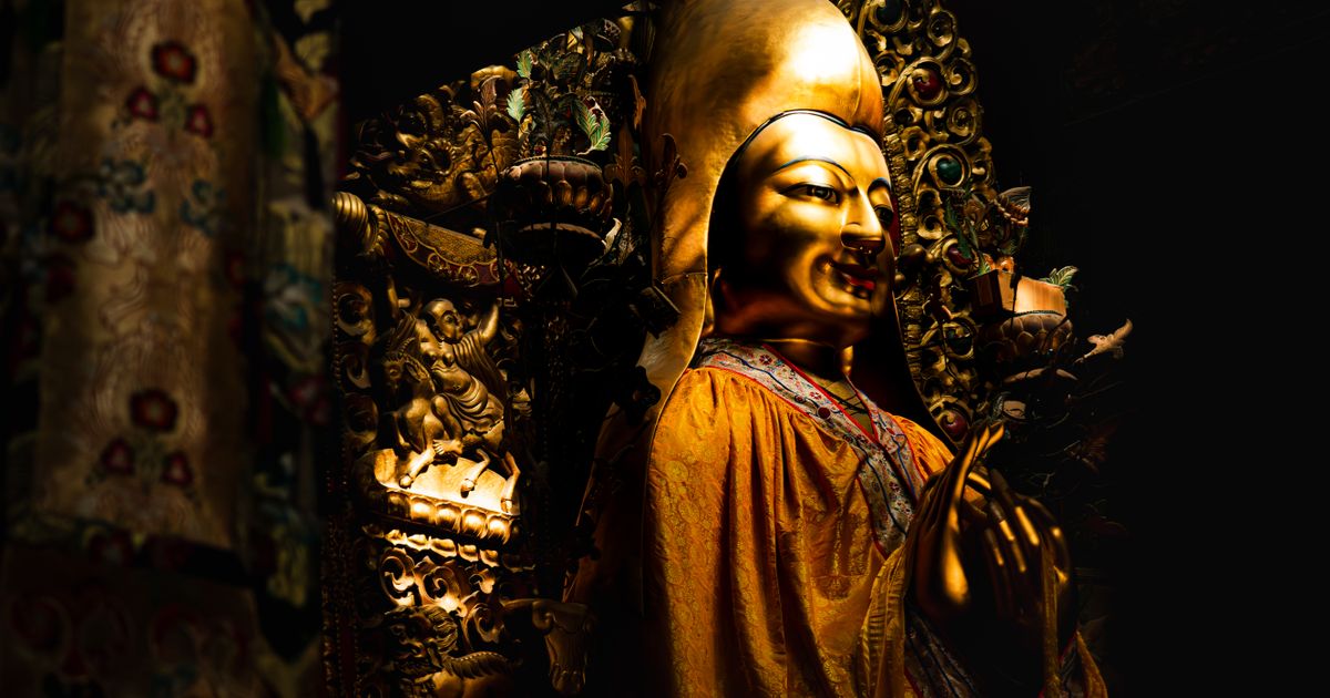 Gilded statue inside the richly decorated Lama Temple