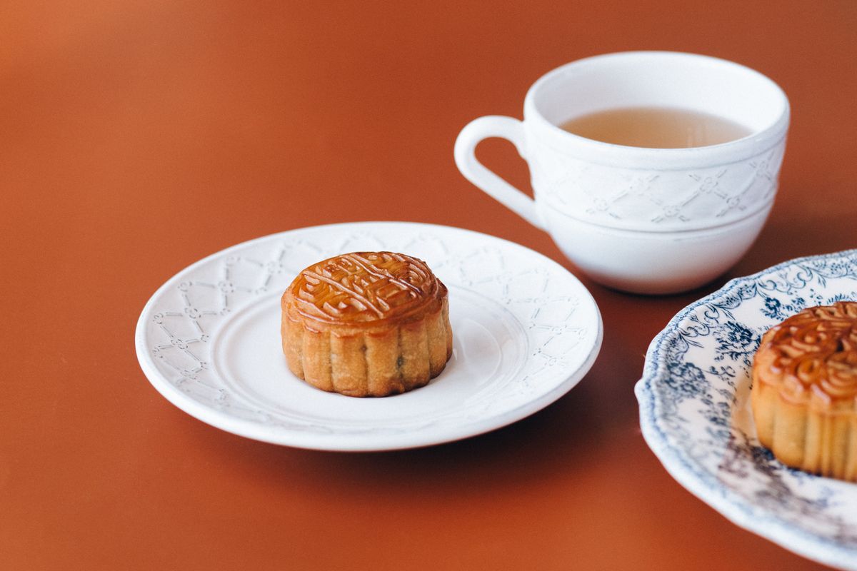 Traditional mooncakes served with tea for the Mid-Autumn Festival