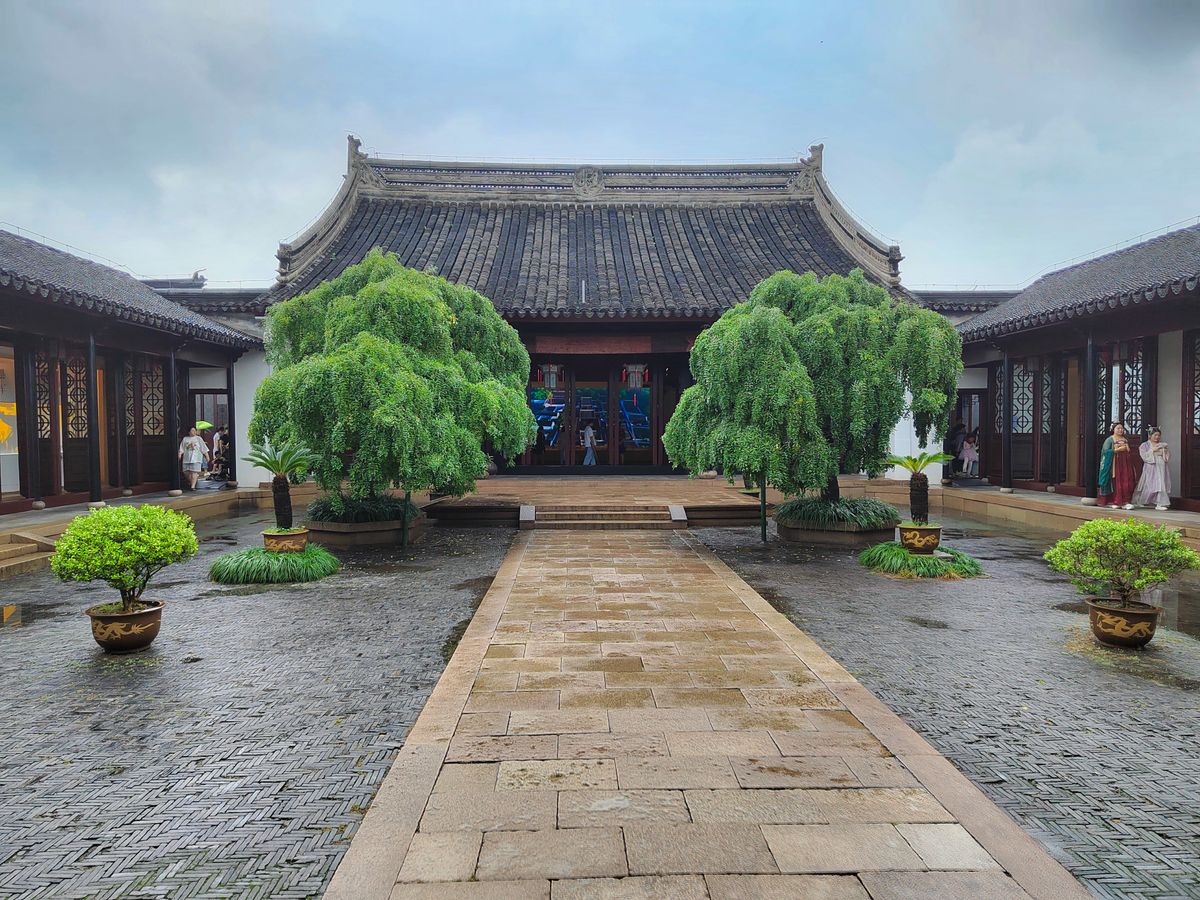 Covered walkway and lattice windows in a Suzhou garden