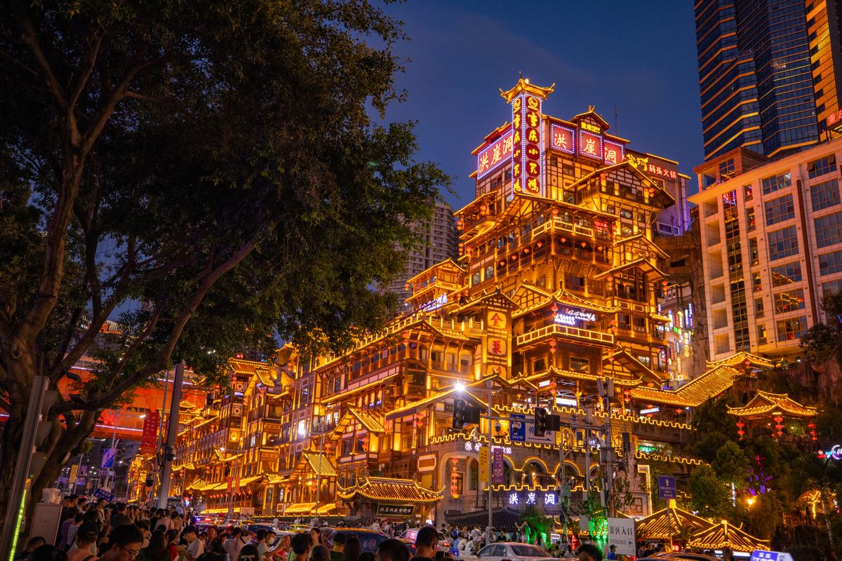 The illuminated Hongya Cave complex above the Jialing River