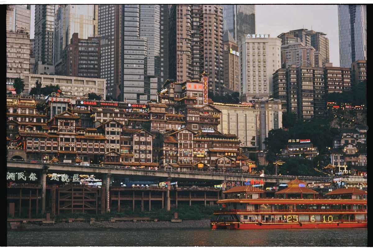 Chongqing's stilted riverside buildings and night cityscape