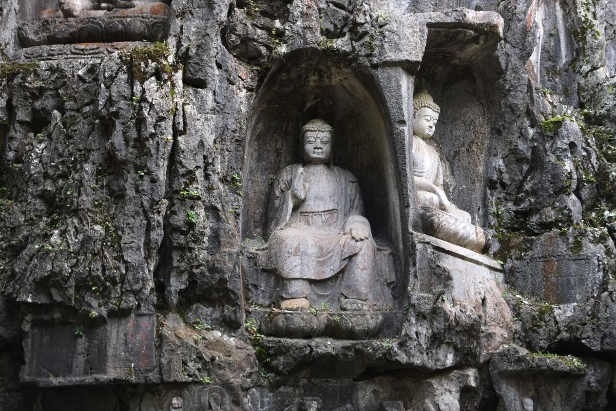 Stone Buddhist carvings on the cliffs of Feilai Feng at Lingyin Temple