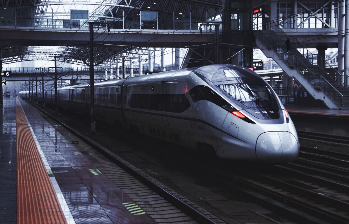 A CRH high-speed train waiting at a Chinese station platform
