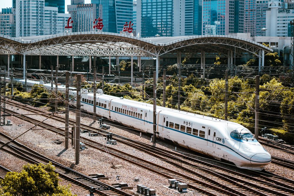 A CRH bullet train departing a major Chinese railway station