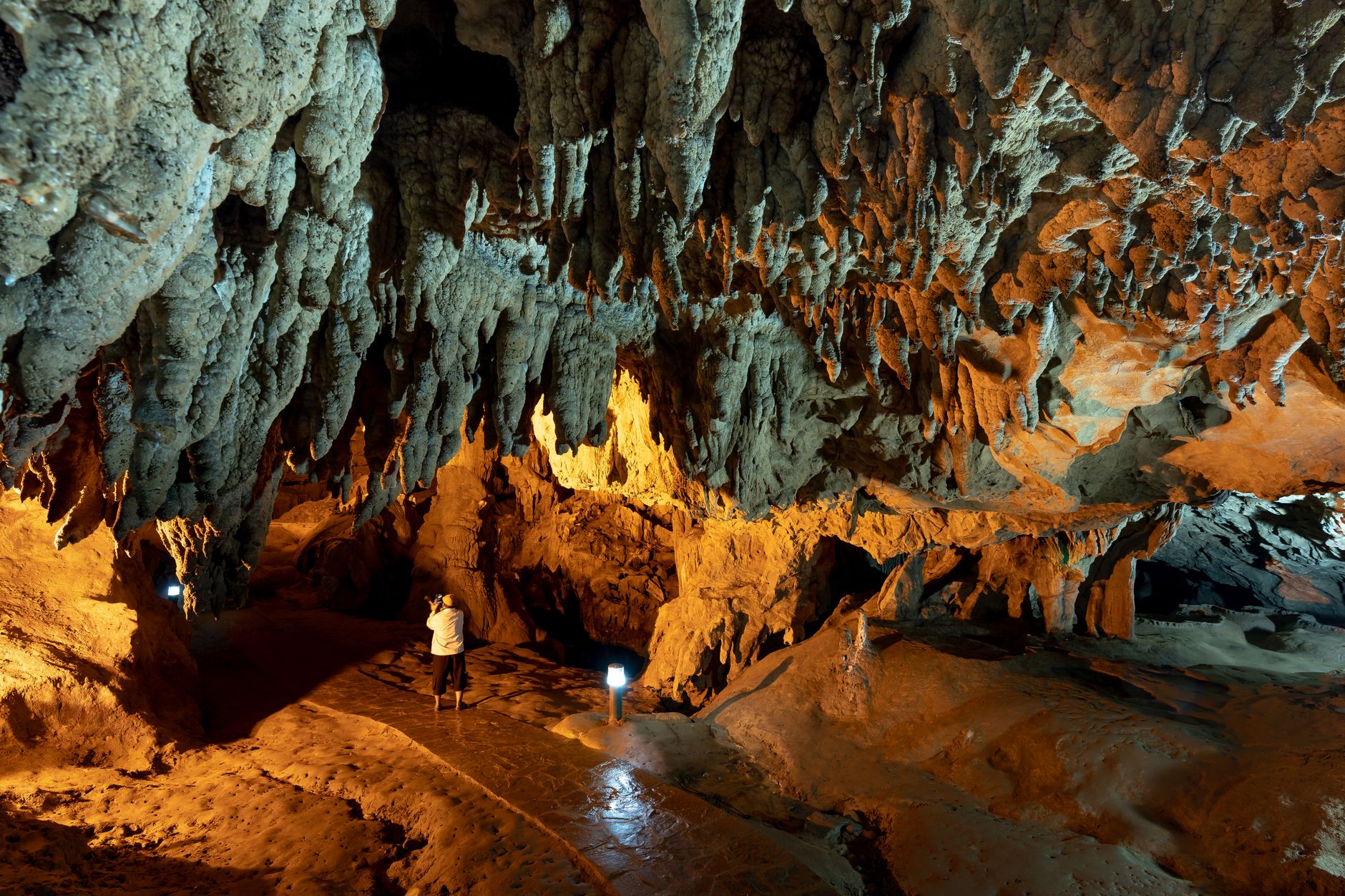 Stalactites and stalagmites along the cave path