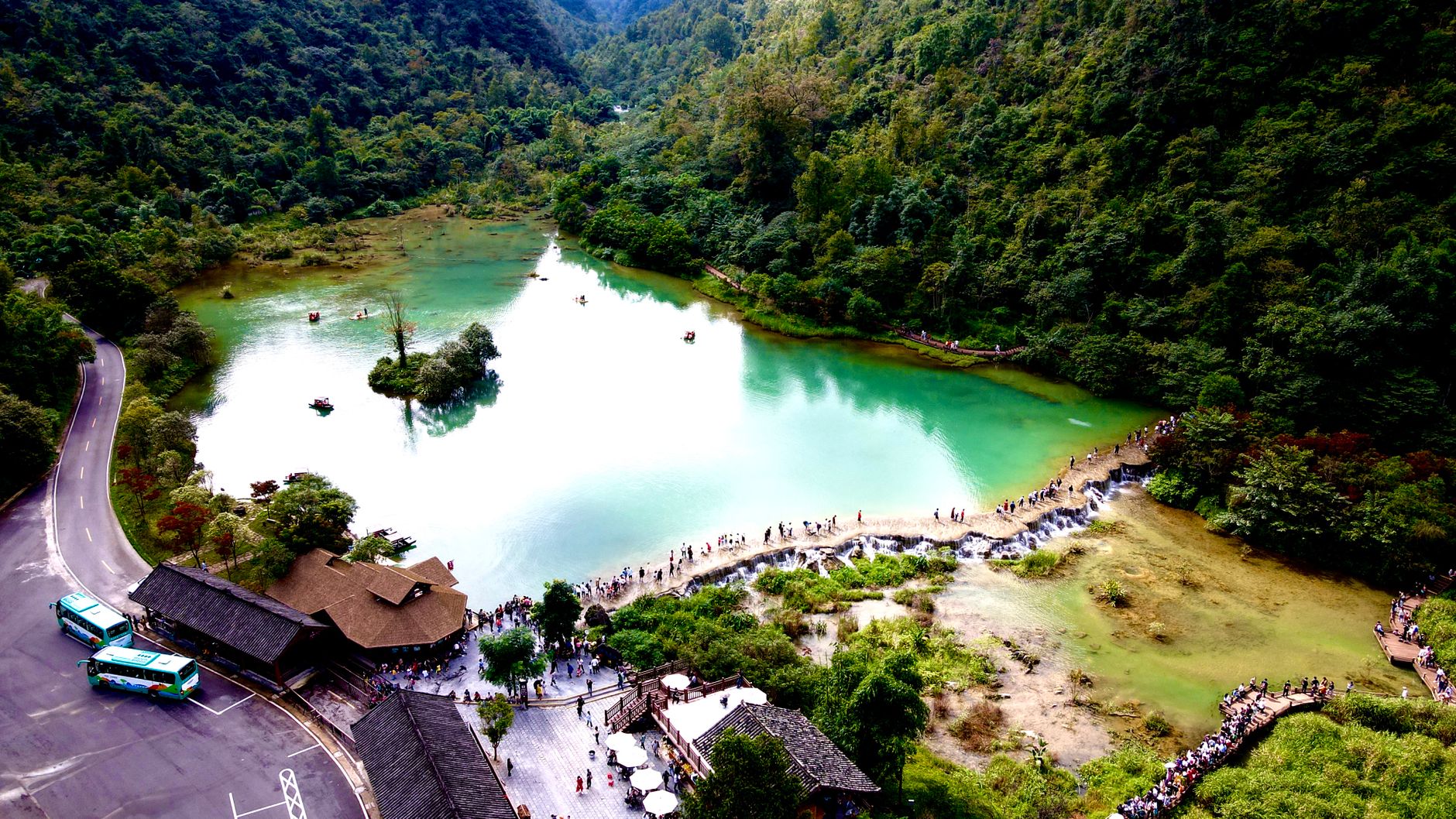 Emerald Baofeng Lake among green karst hills
