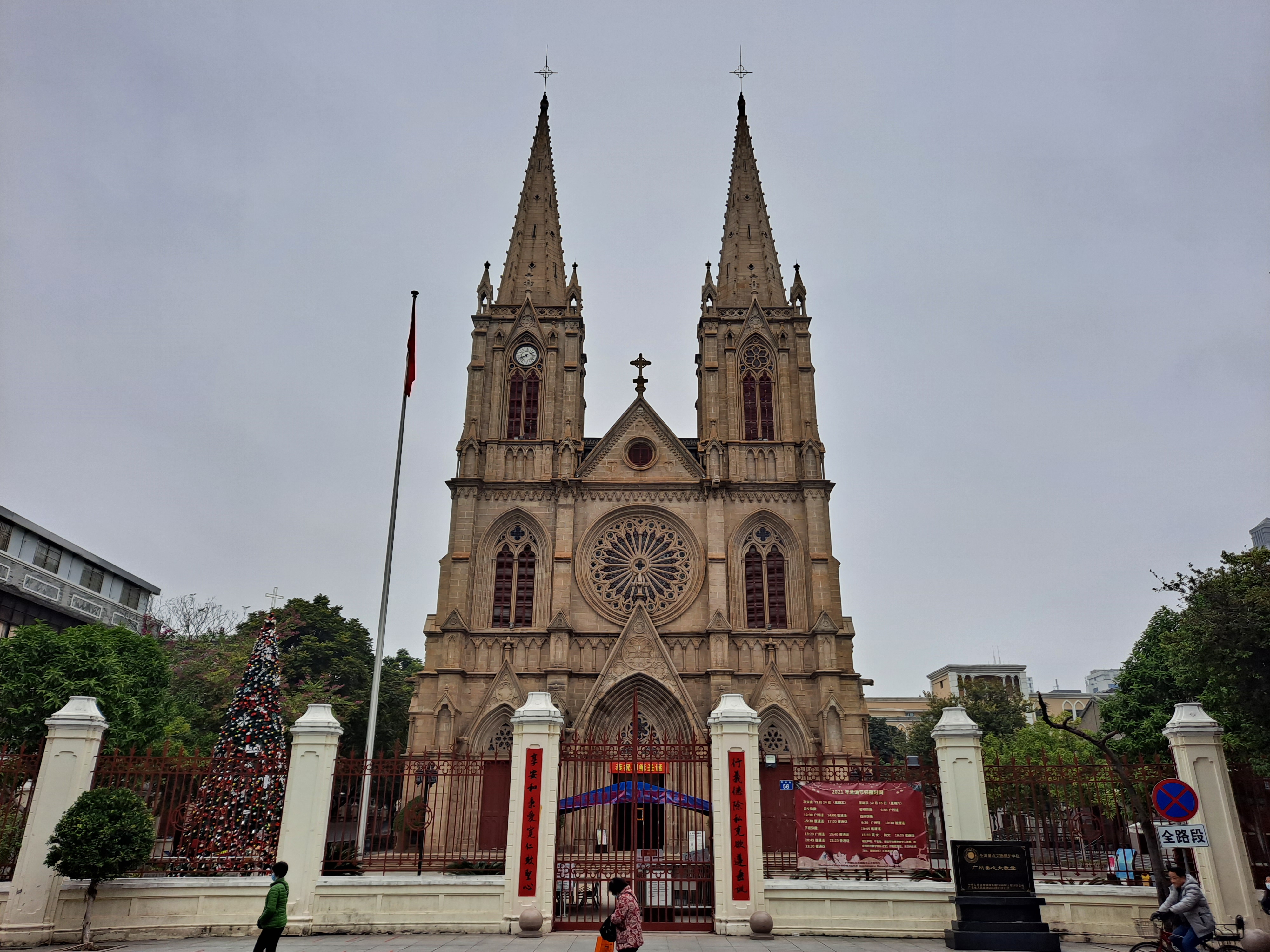 The granite Gothic facade of Sacred Heart Cathedral with its twin spires