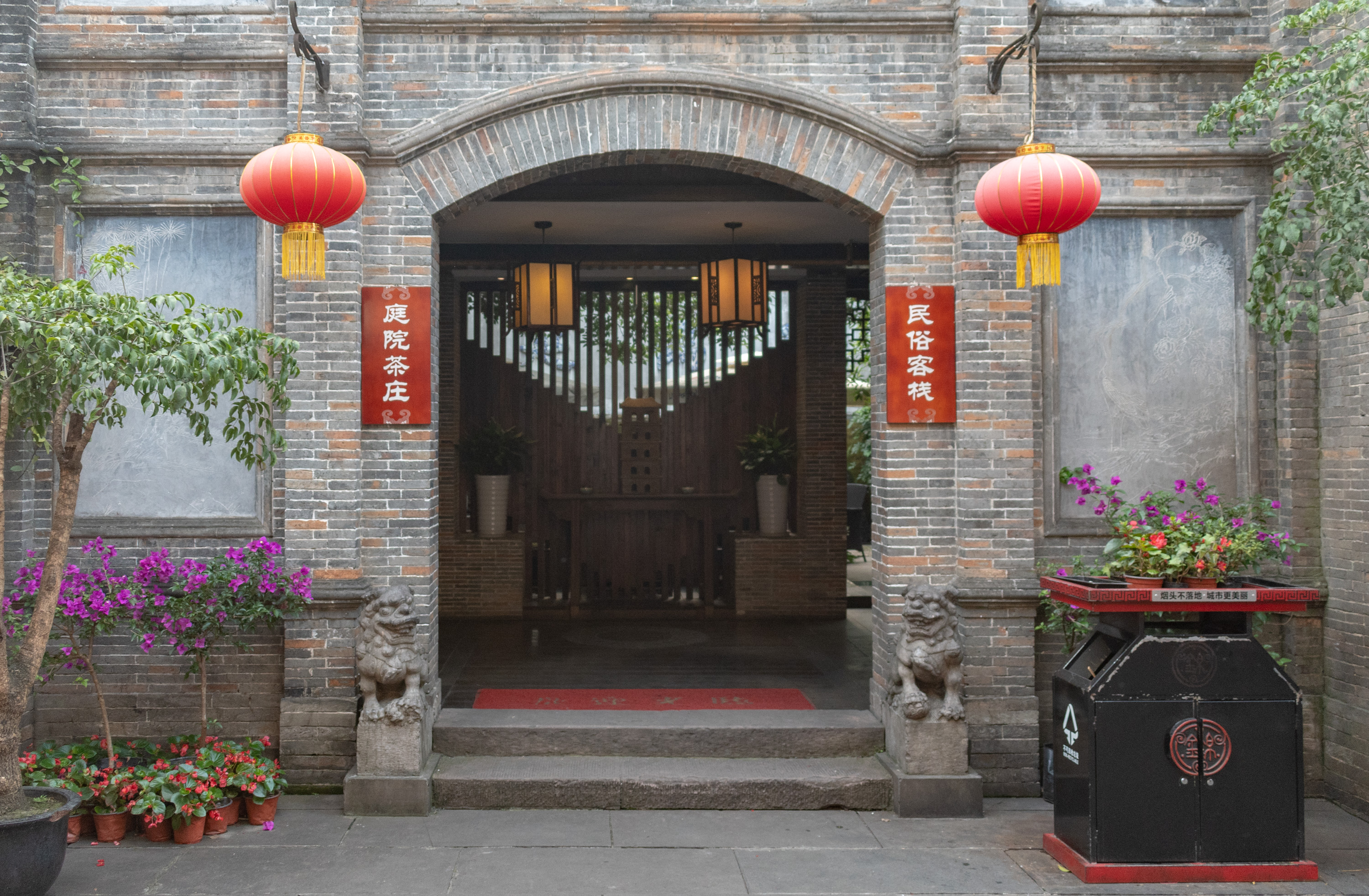 Red lanterns and grey-tiled shopfronts along Jinli Ancient Street, Chengdu