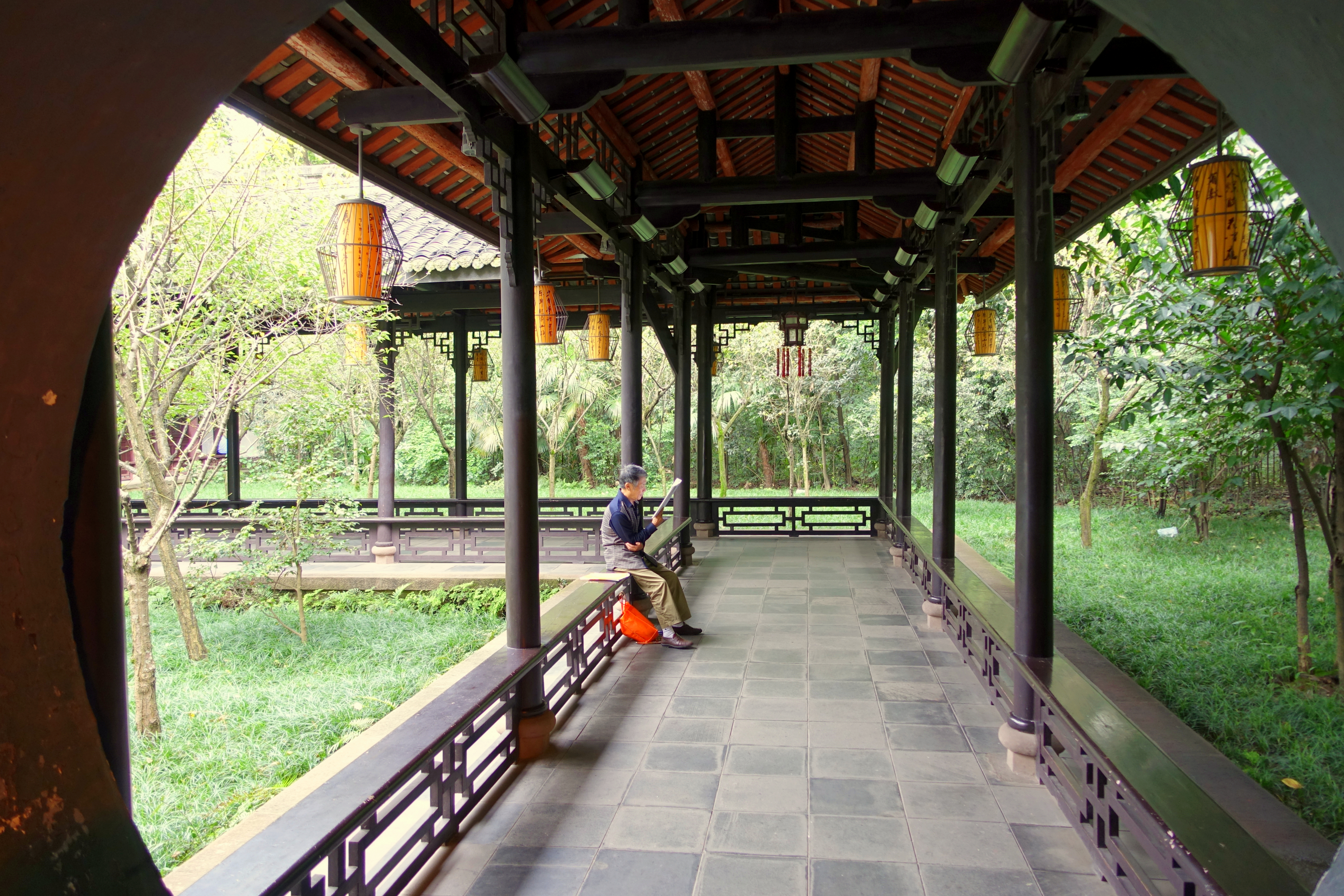 Covered corridor and greenery in the Du Fu Thatched Cottage gardens, Chengdu