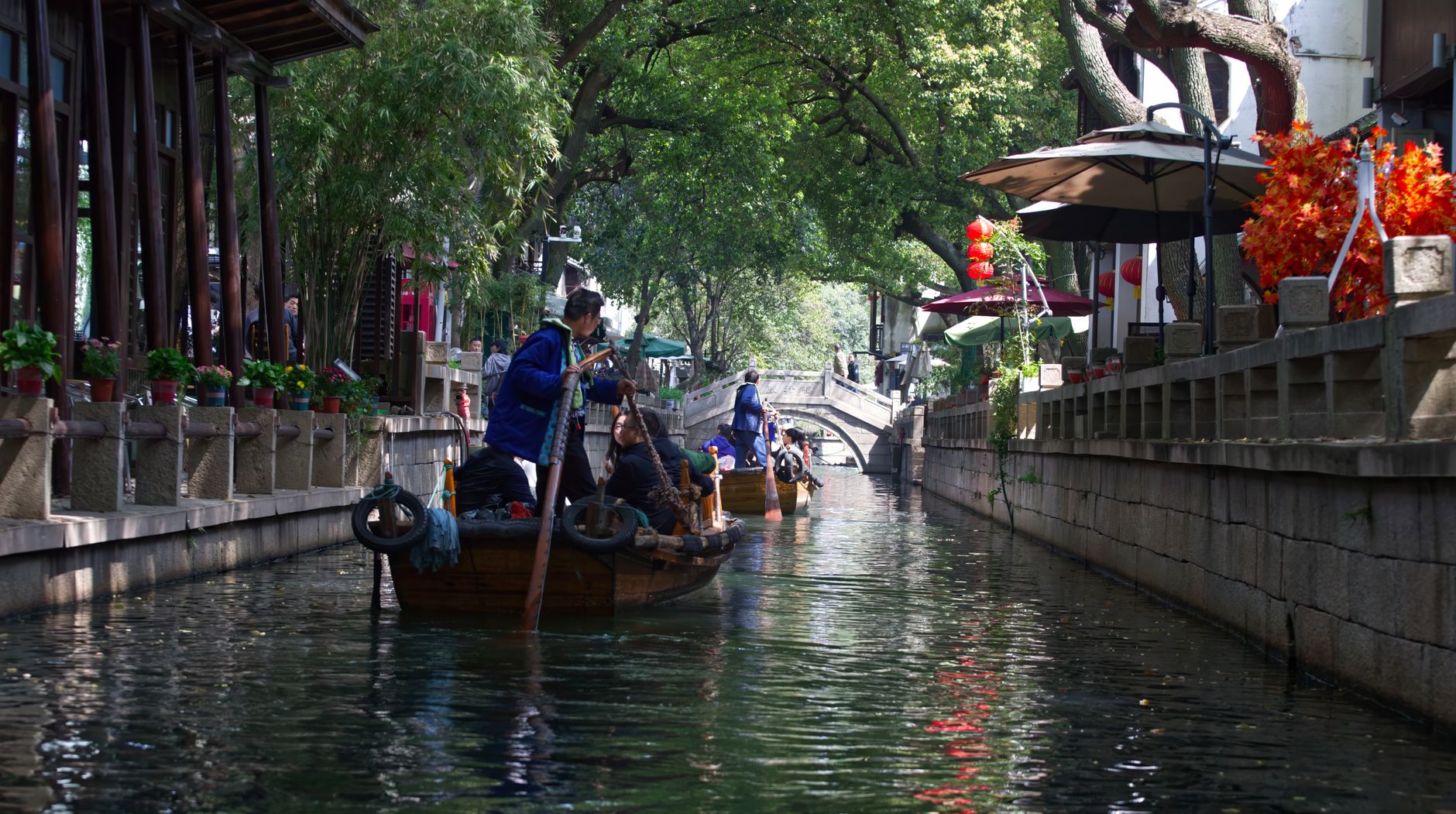 Boat gliding along the narrow canal