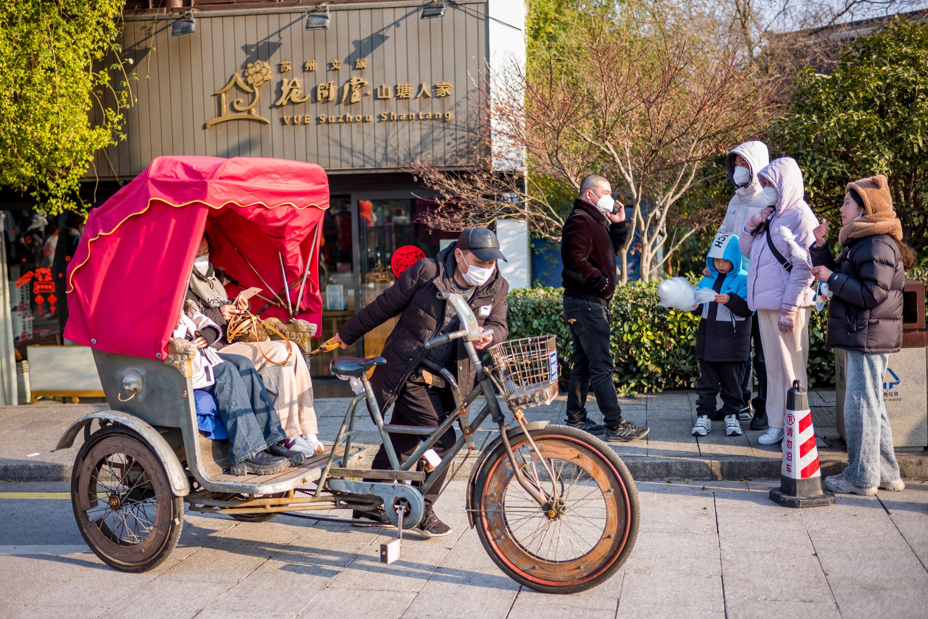 Lively shopfronts and street life on Shantang