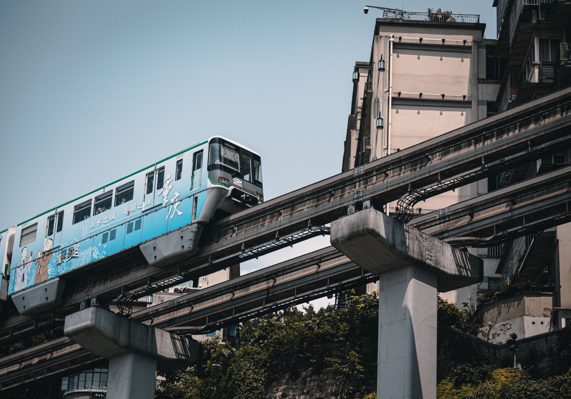 Chongqing's blue-liveried monorail on an elevated track