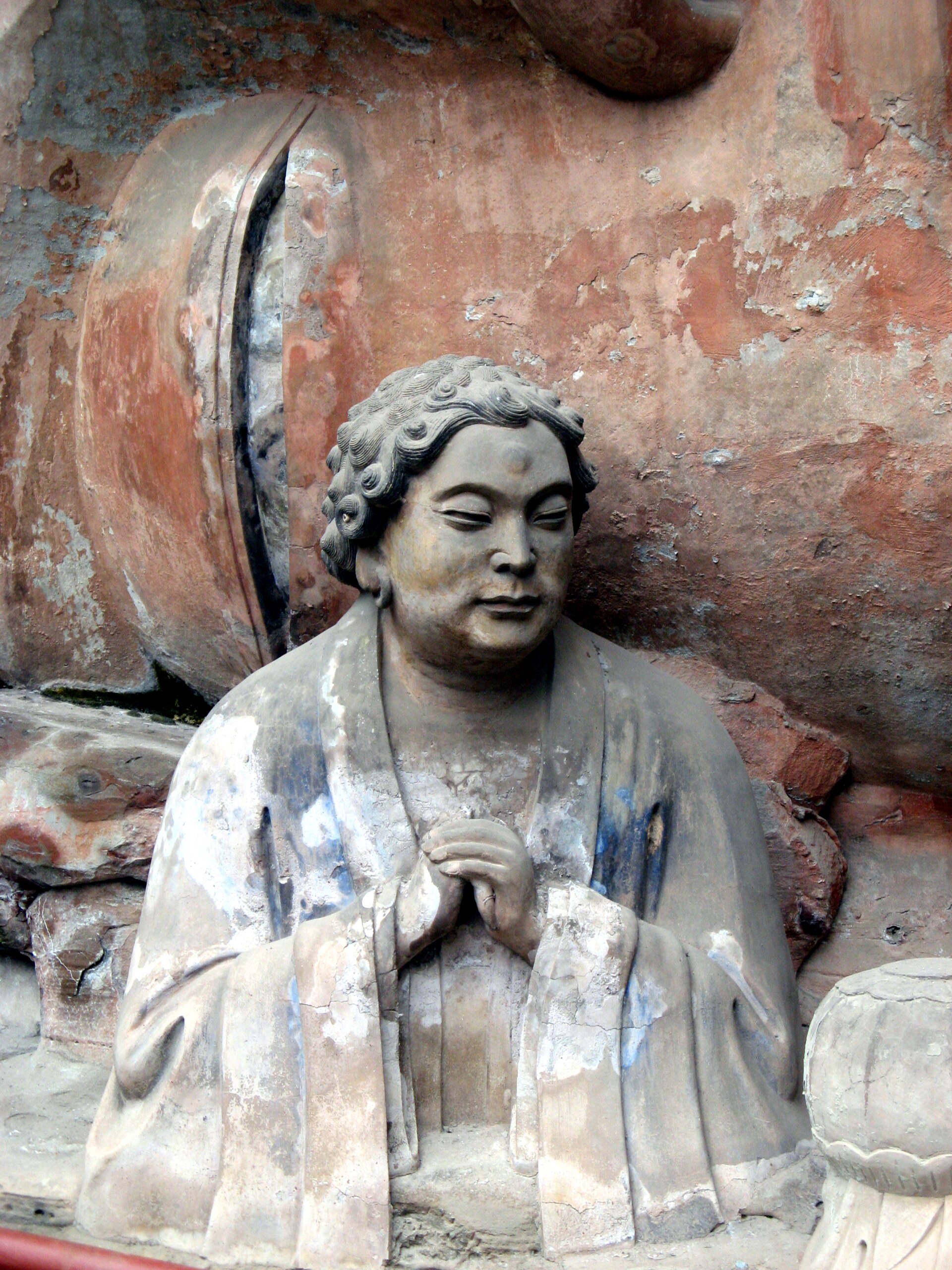 Detailed stone figure among the Dazu carvings