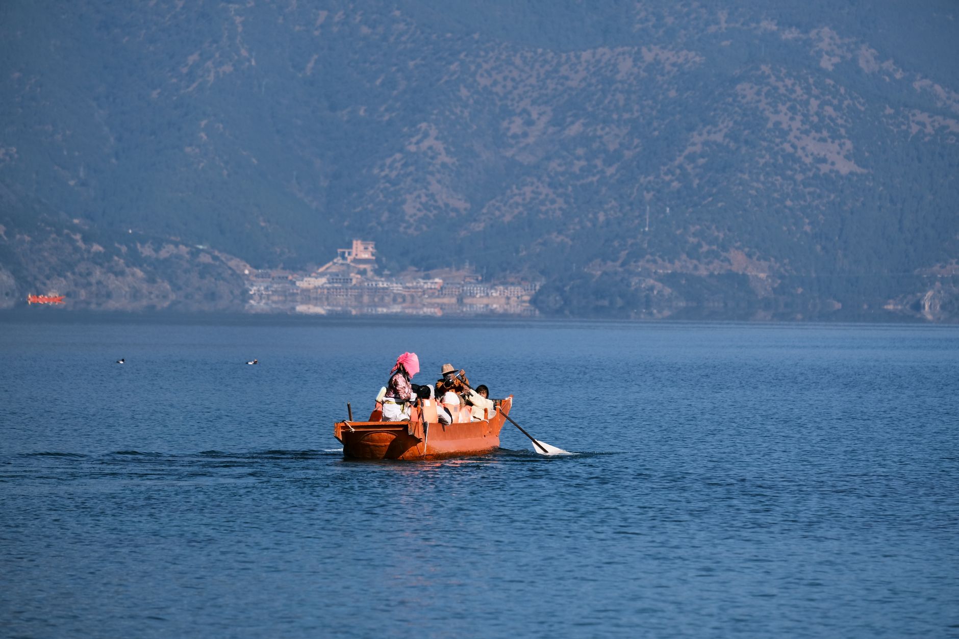 Wooden dugout canoes on the calm lake