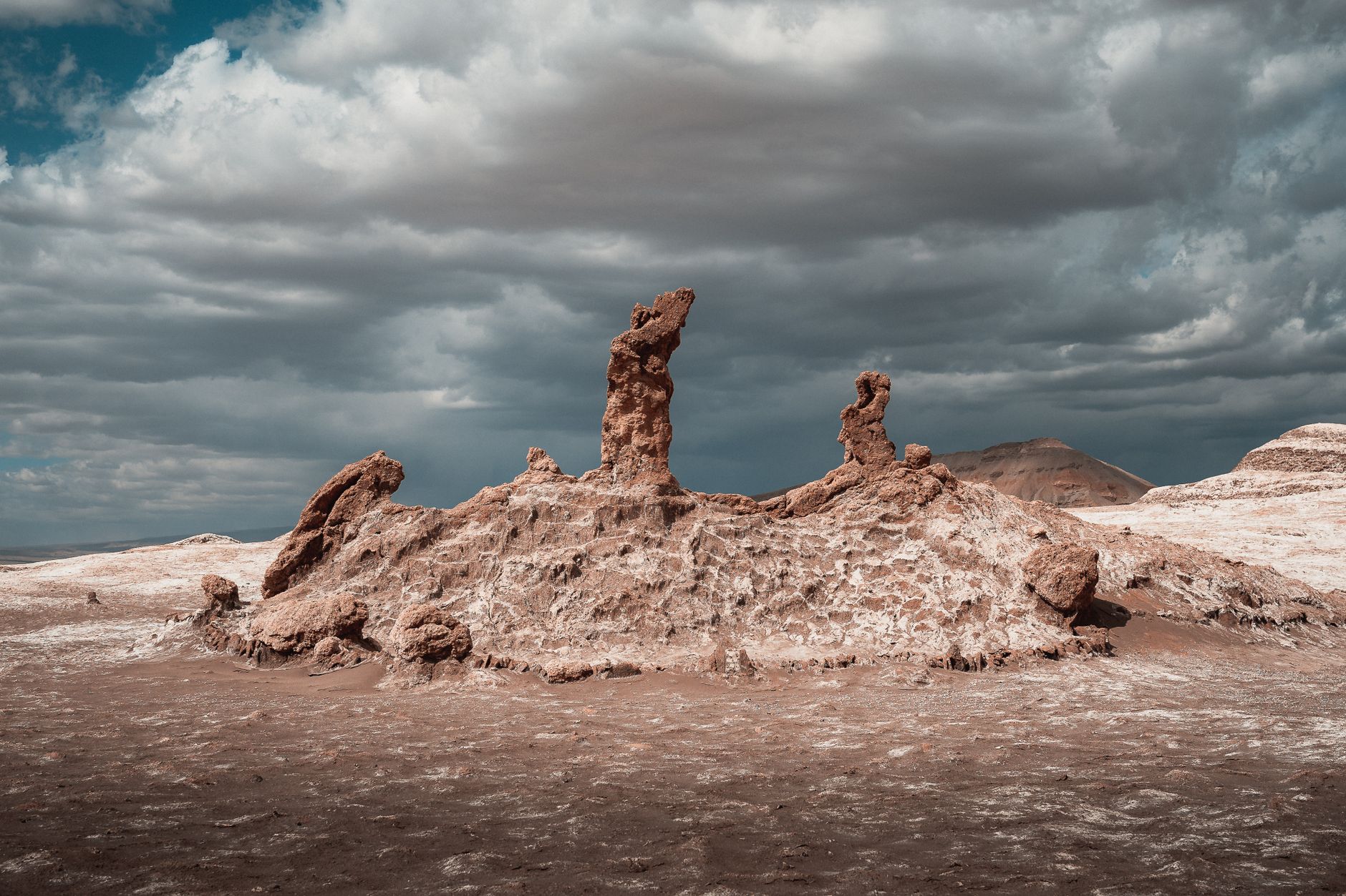 Castle-like rock formation glowing in low desert light