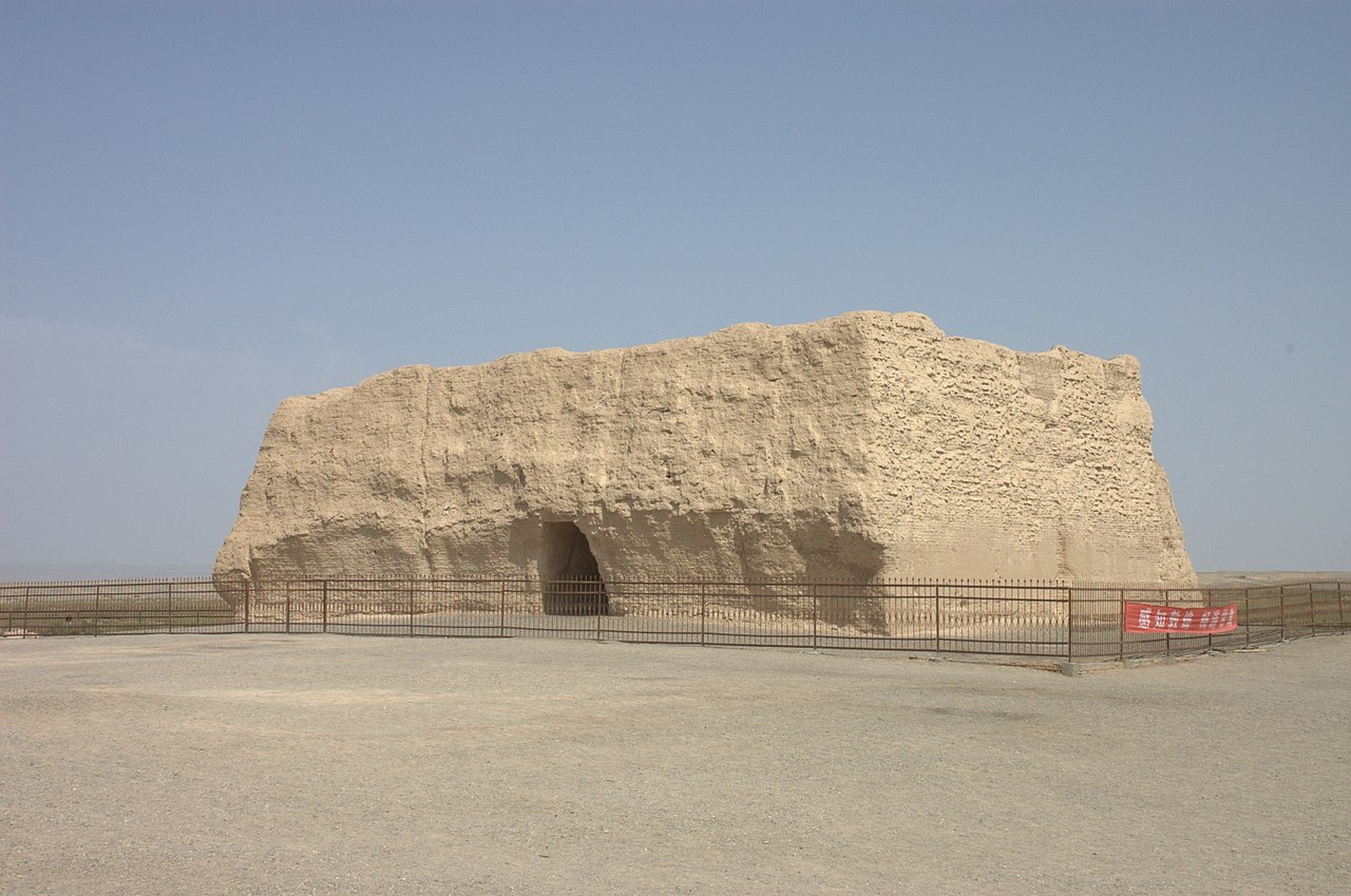 The rammed-earth Small Square Castle of Yumen Pass standing alone in the Gobi
