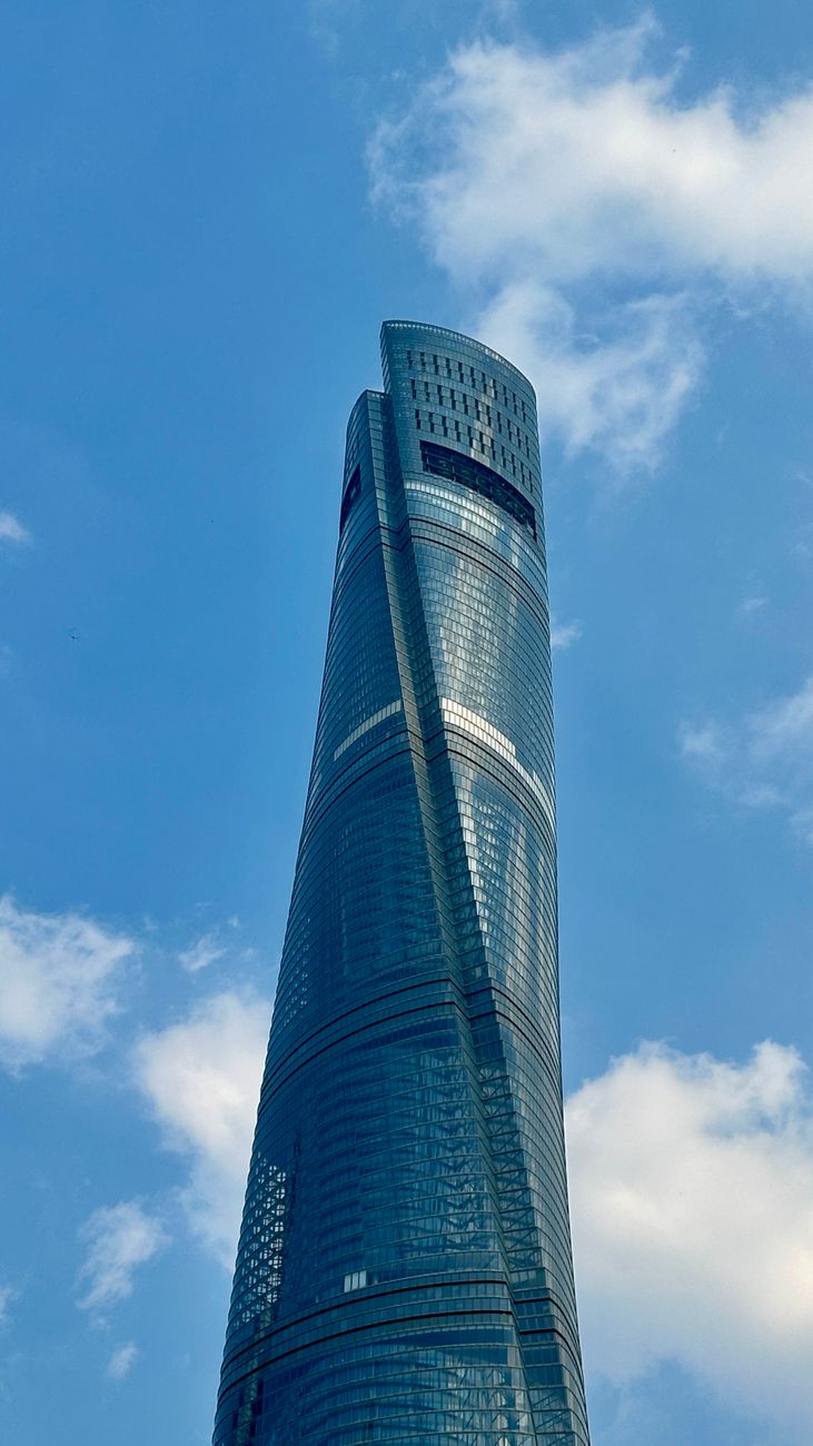 The twisting form of Shanghai Tower against the sky