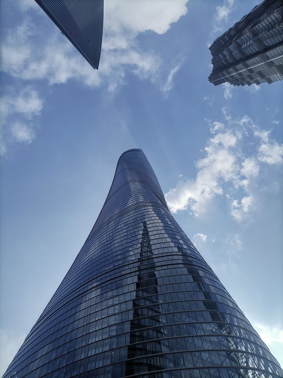 Low-angle view of the tower among Lujiazui skyscrapers