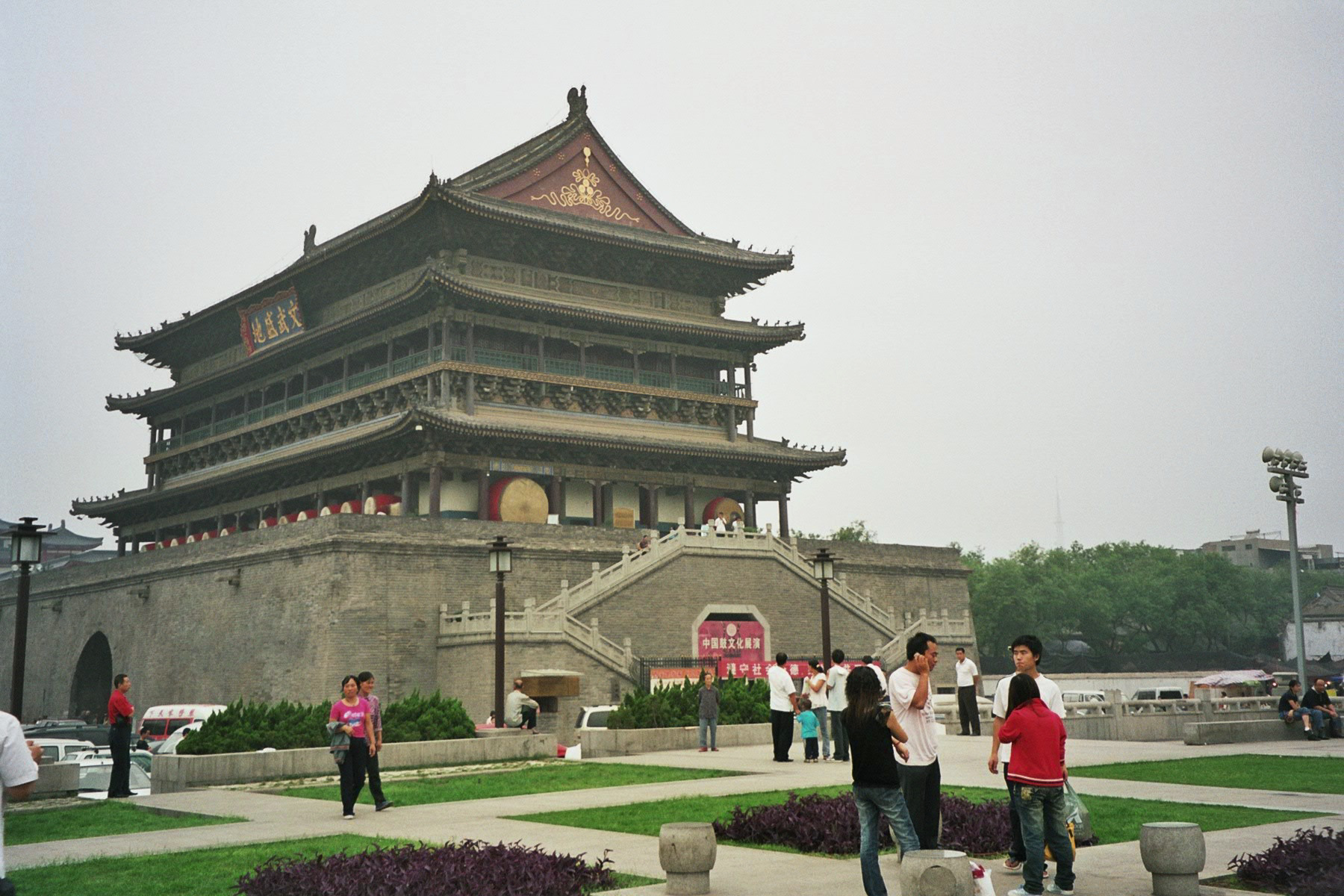 The Drum Tower lit in red and gold after dark