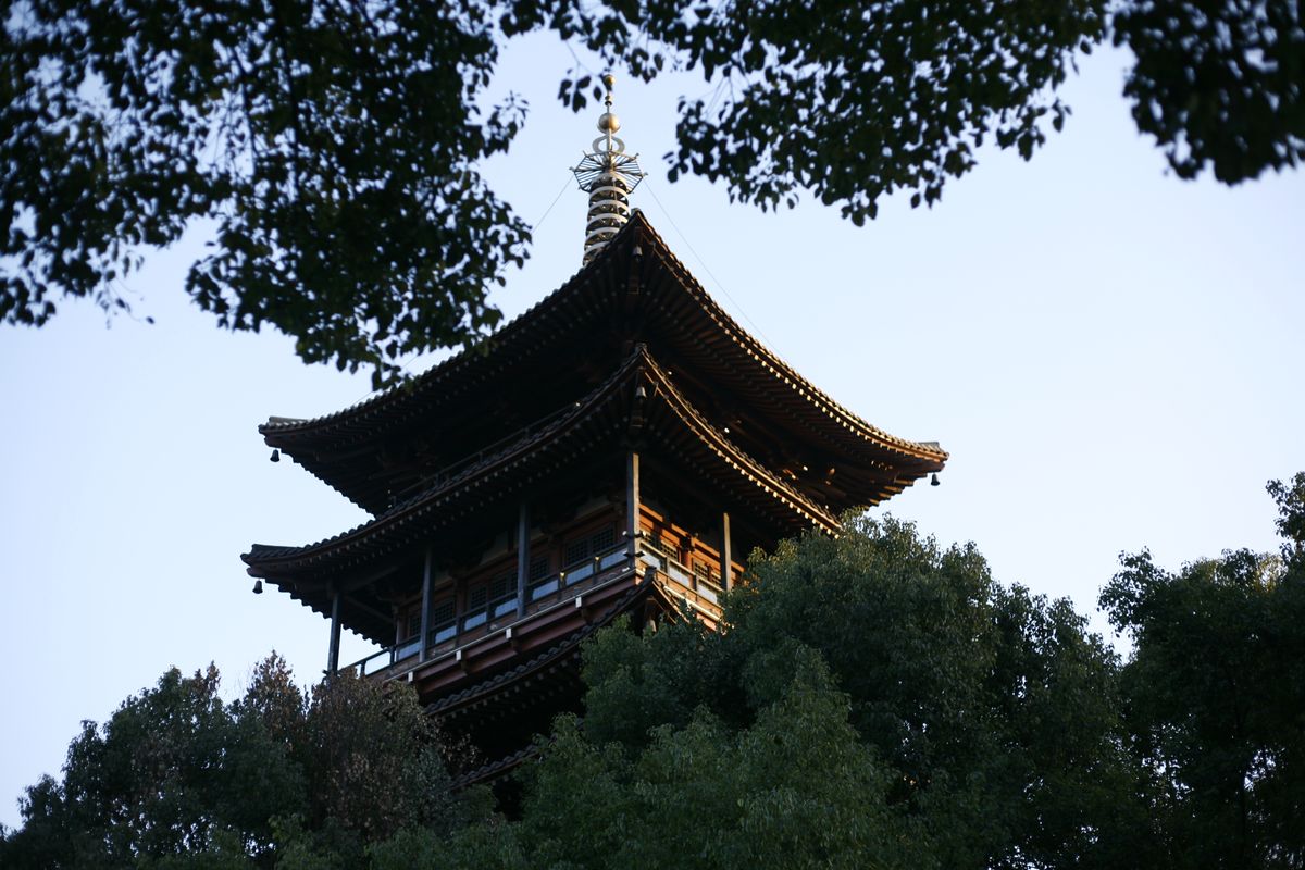 The multi-eaved Six Harmonies Pagoda decorated with lanterns