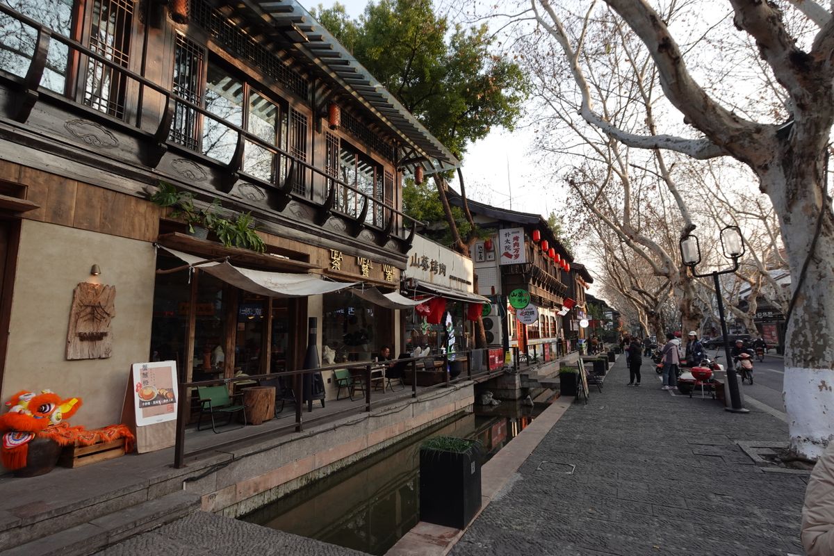 Restored Qing-style shopfronts and lanterns along Qinghefang