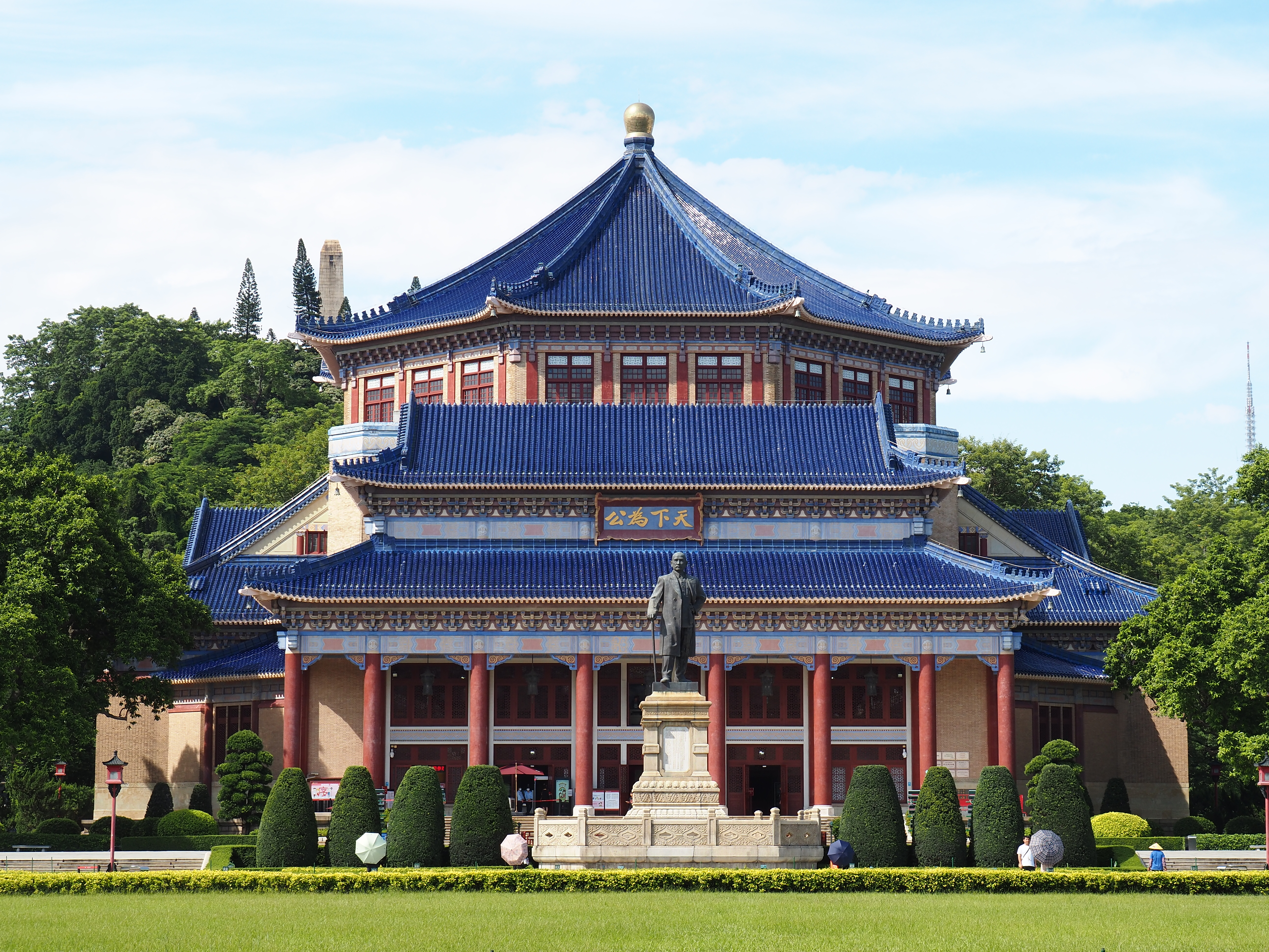 The grand front facade of the Sun Yat-sen Memorial Hall under a blue sky