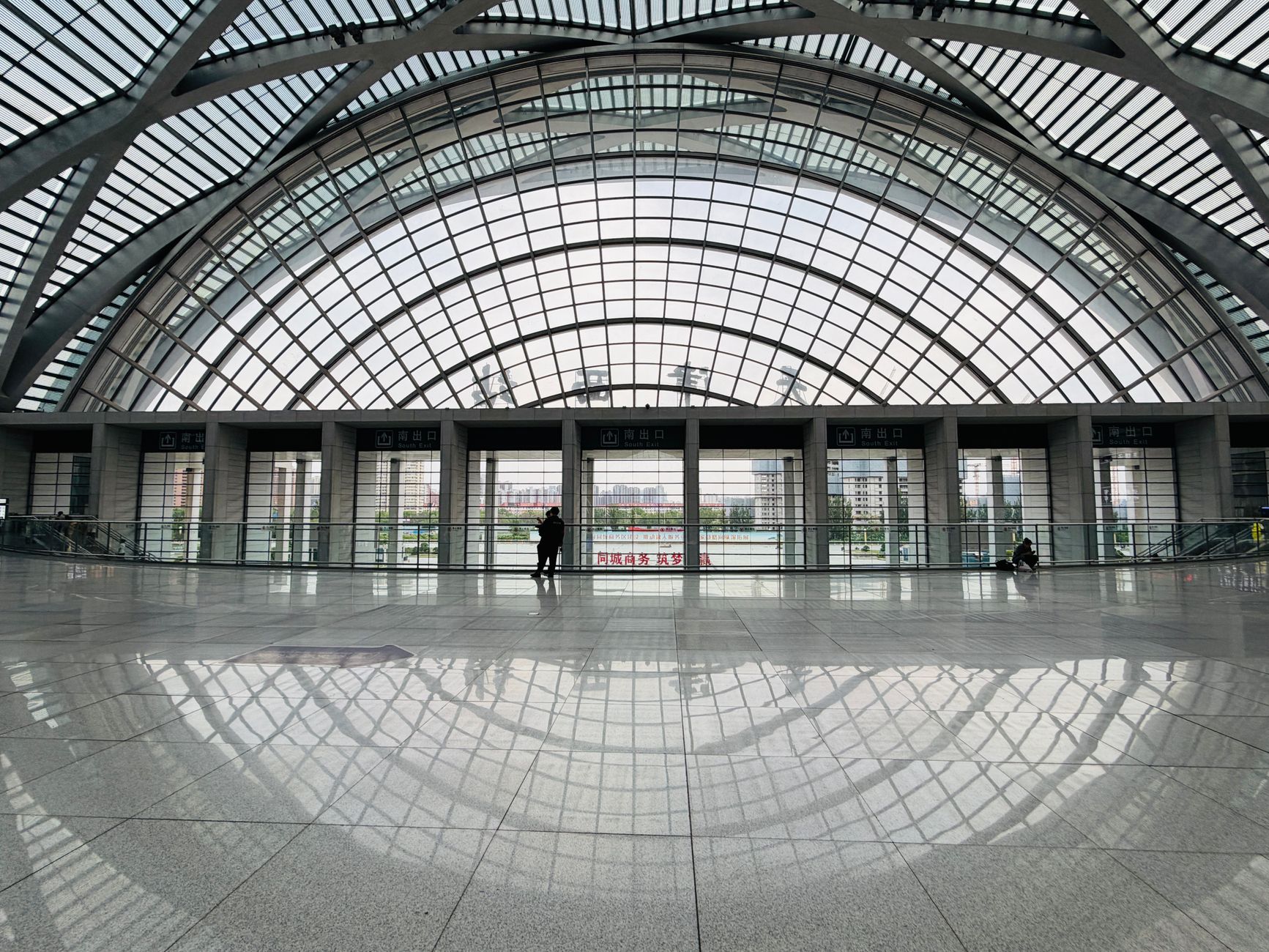 Soaring glass roof of the Tianjin West Railway Station concourse