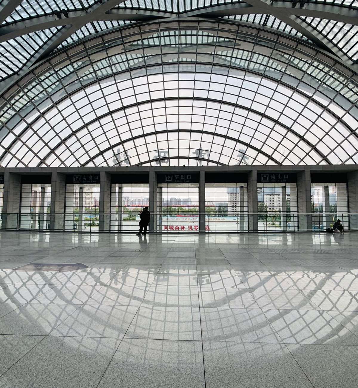 Soaring glass roof of the Tianjin West Railway Station concourse