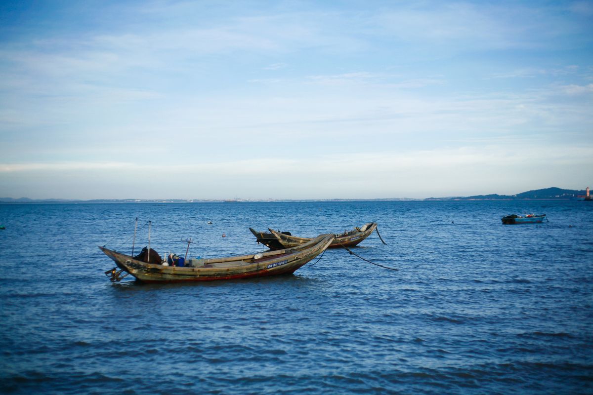 Traditional wooden fishing boats off the Xiamen coast near Zengcuo'an