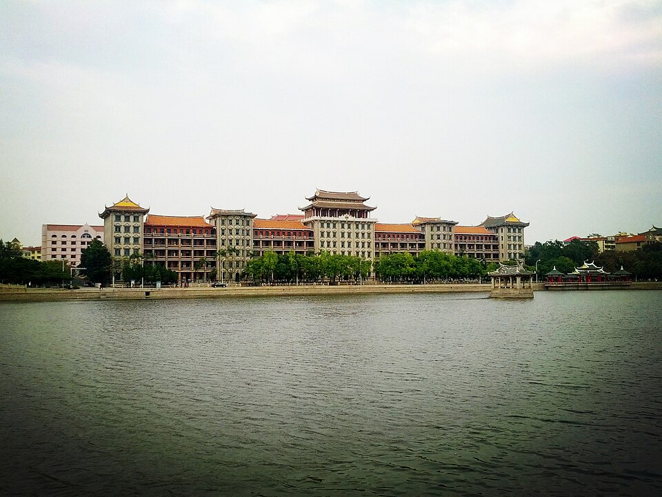 Jiageng-style school buildings reflected across Longzhou Pool
