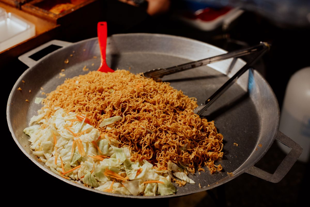 A street stall wok of stir-fried Xiamen-style noodles