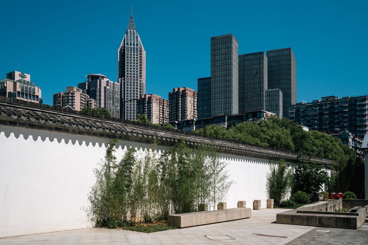 Modern skyline meeting traditional rooftops in Nanjing