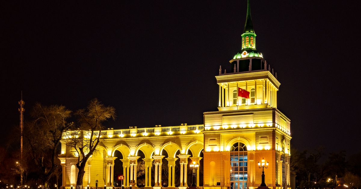 Historic European architecture lit up at night on Central Street, Harbin
