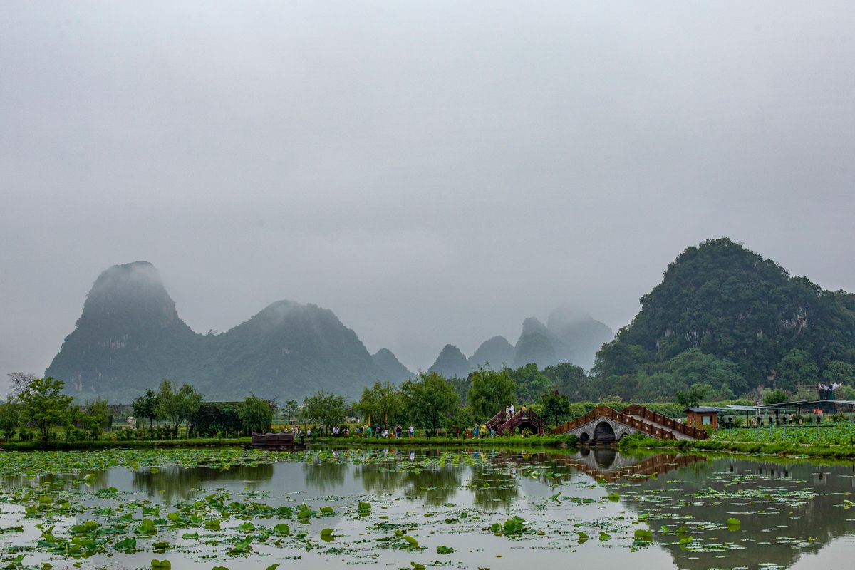 Misty karst peaks rising around the Moon Hill area near Yangshuo
